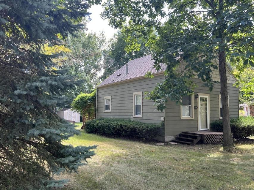 Side of home with detached garage