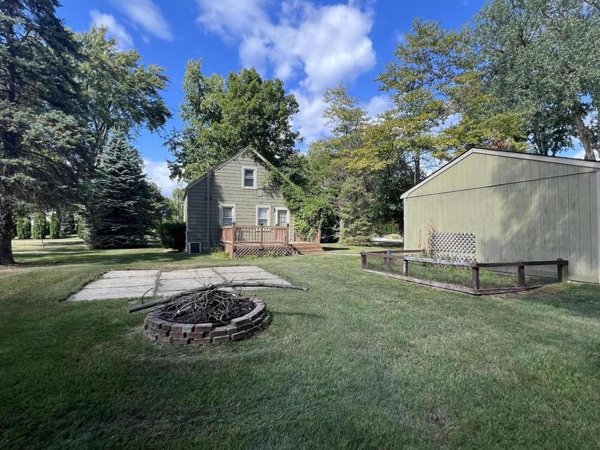 Cement patio and fire-pit area
