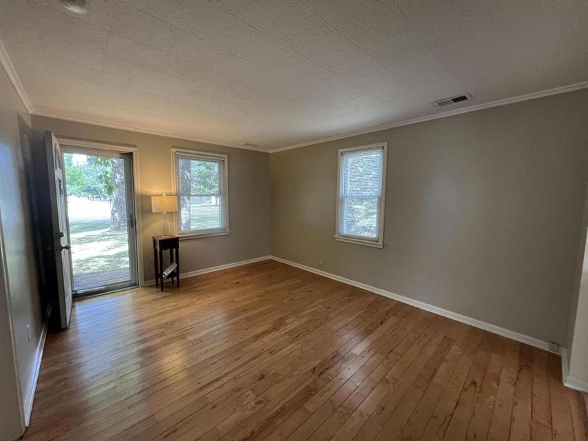 Living room with wood-plank ceiling