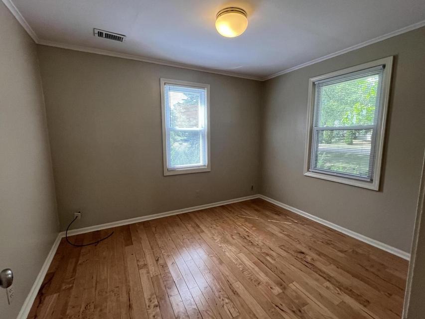 Main-floor bedroom, two windows